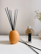 Load image into Gallery viewer, Reed Diffuser in orange ceramic vase