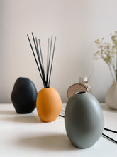 Load image into Gallery viewer, Reed Diffuser in orange ceramic vase